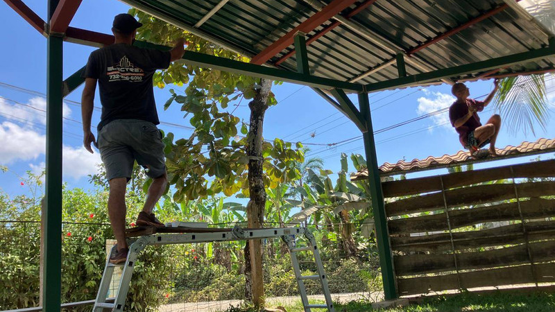 Painting the community center las tumbas